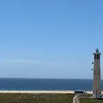Faro Y Playa