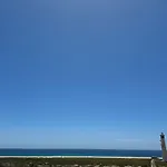 Faro Y Playa